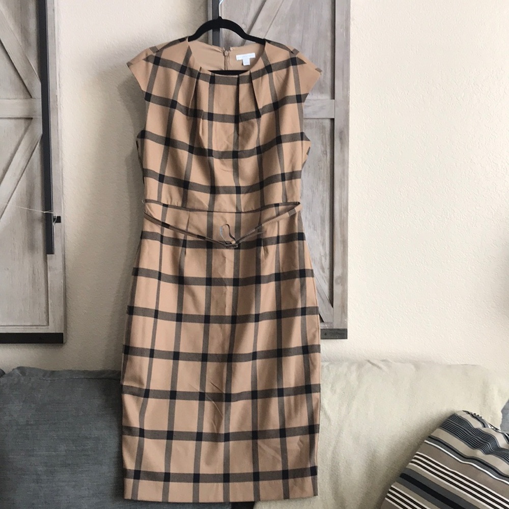 Tan and black women’s dress